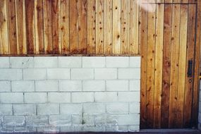 masonry near the wooden wall