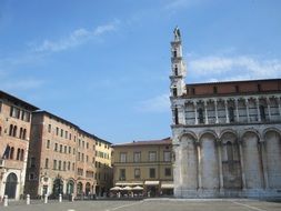 side view of old church on plaza, italy