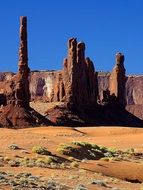 ancient totems on a desert valley