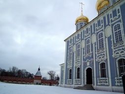 blue temple with golden domes in Russia