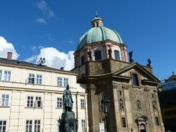 historic building with a dome in the center of Prague