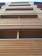 wooden facade of an apartment building