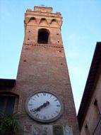 large clock on a medieval tower