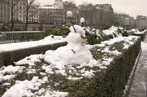 snow figure on the street in paris
