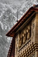 building facade on a background of a mountain