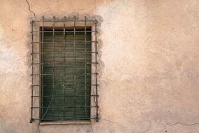 grille on an old closed window