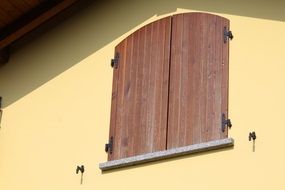 Wooden window on a building wall