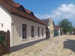 low house on the street of an old house