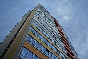 high house stretching into the sky in city