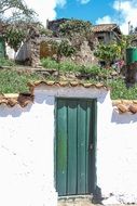 green doors of an old country house