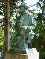 Stone sculpture in the cemetery in Paris
