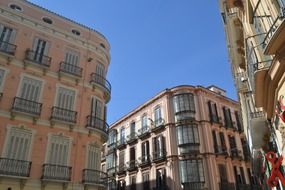 Bright pink houses in Granada, Spain