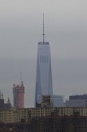 Freedom Tower of One World Trade Center in the clouds, usa, manhattan, nyc