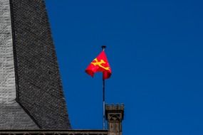 red and yellow flag on a building