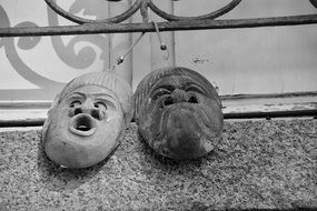 sculpture masks in black and white background