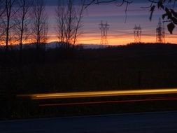 beacon light on the road at night