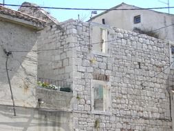 facades of stone walls in Croatia