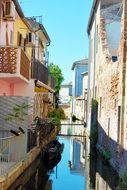 water channel in city at summer day