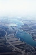 aerial view of town and fields by a river