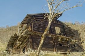 old destroyed wooden house