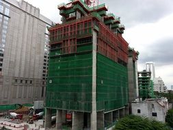 green forests on a construction site in Bangkok