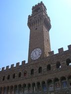 marble tower with clock at sky, italy, florence