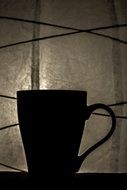 blck silhouette of the mug