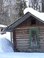 Vintage log cabin in the winter