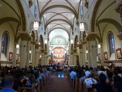 People inside the church of Santa Fe