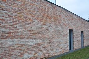 brick wall with two entrances