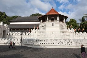 fortress with white walls and brown roof