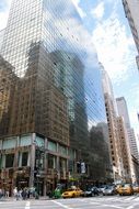 reflection of high building in New York