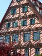 red and white fachwerkhaus in ulm