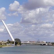 Alamillo Bridge under cloudy sky, spain, seville