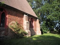 red brick church in the countryside