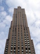 skyscraper on a background of the cloudy sky in New York