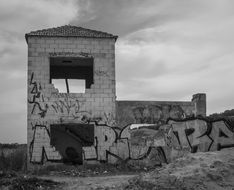 ruins of an abandoned house with graffiti