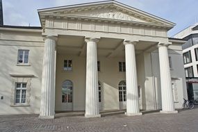 white stone building with columns