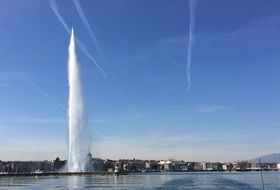 fountain on the river near the city