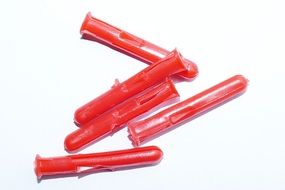 red plastic plugs