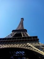 steeple ofthe Eiffel Tower stretching into the sky