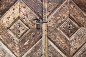 pattern on the wooden door of the church close-up