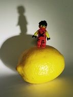 Lego figure is on lemon