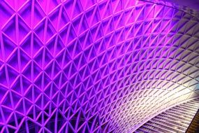 colorful illuminated roof of kingâs cross subway station, uk, england, london