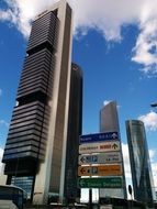 cityscape of skyscrapers and road signs in Madrid