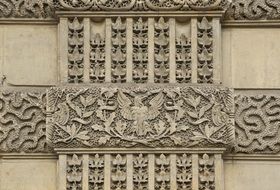 Embossed wall with decorations