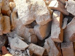 closeup picture of breaking bricks after the dismantling of the building