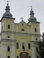 church with yellow walls in transylvania