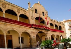 flags on the town hall in spain