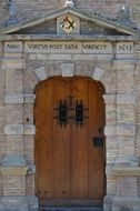 wooden door of a historic building in the port